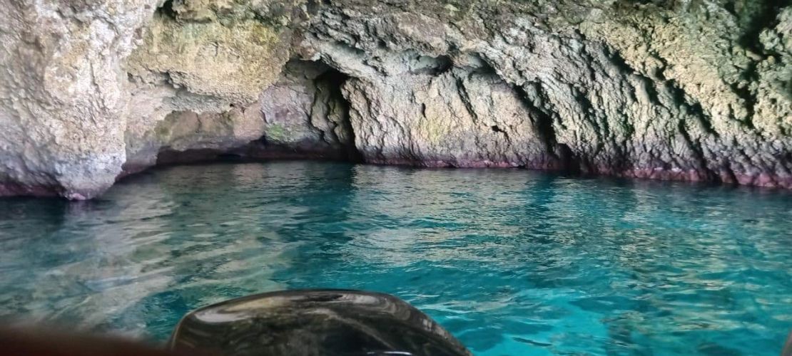 Swimmers relaxing in bright turquoise Caribbean water