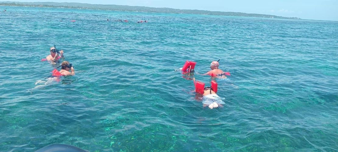 Cliff jumping into the blue water of Negril