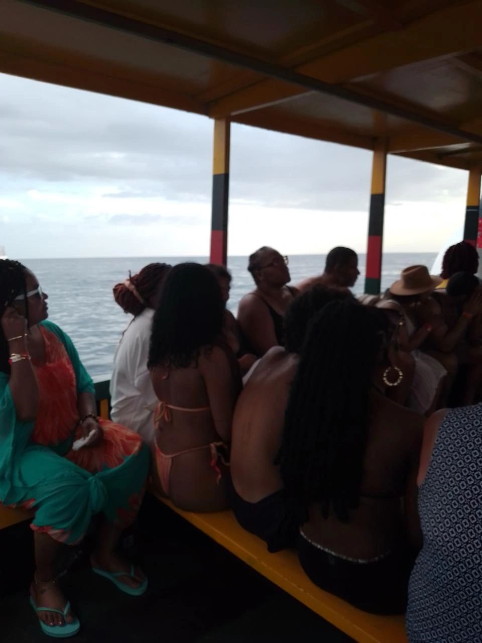 Guests posing at Rick's Café in Negril